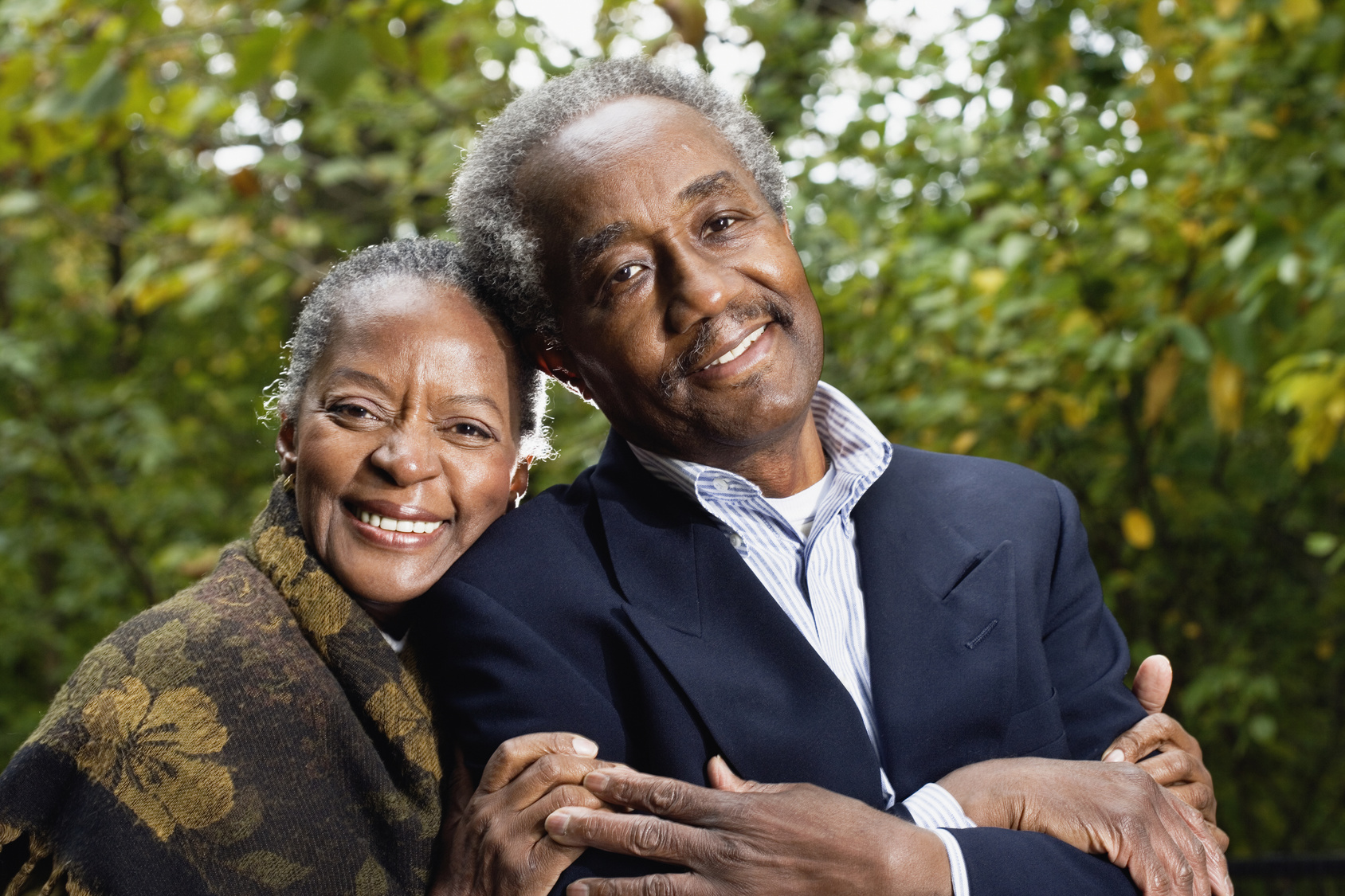 Senior African Couple Smiling In Woods
